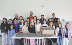 Students and staff of Eardley Elementary with Former Aylmer legion member Andre Boivine, together at the bottle cap collection on Monday, May 25, 2026. Photo: Jude Osmond