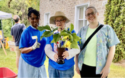 From left: Volunteer Plant Sale helper Celia Perry; Lydia Gionet, volunteer plant expert and shopper Veronica Black. Ms Perry was part of a wider Western Quebec Career Center team of volunteers that day. Photo: Lily Ryan