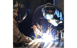 Quebec's Bill 8 would push adult and vocational students into French-language schooling, a move the government calls overdue protection for French and critics call a needless barrier to training in trades like welding that the province is already short of, all of it unfolding months before an election. Photo: Lord Aylmer School, courtesy of the Aylmer Bulletin archives, from 